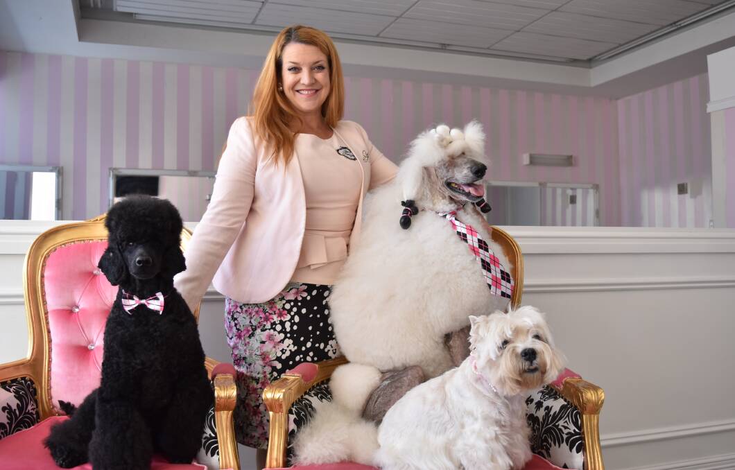 Jacqui Ainsworth with her dogs Billy, Lexie and Flynn at the soon to be open House of Artizan. 