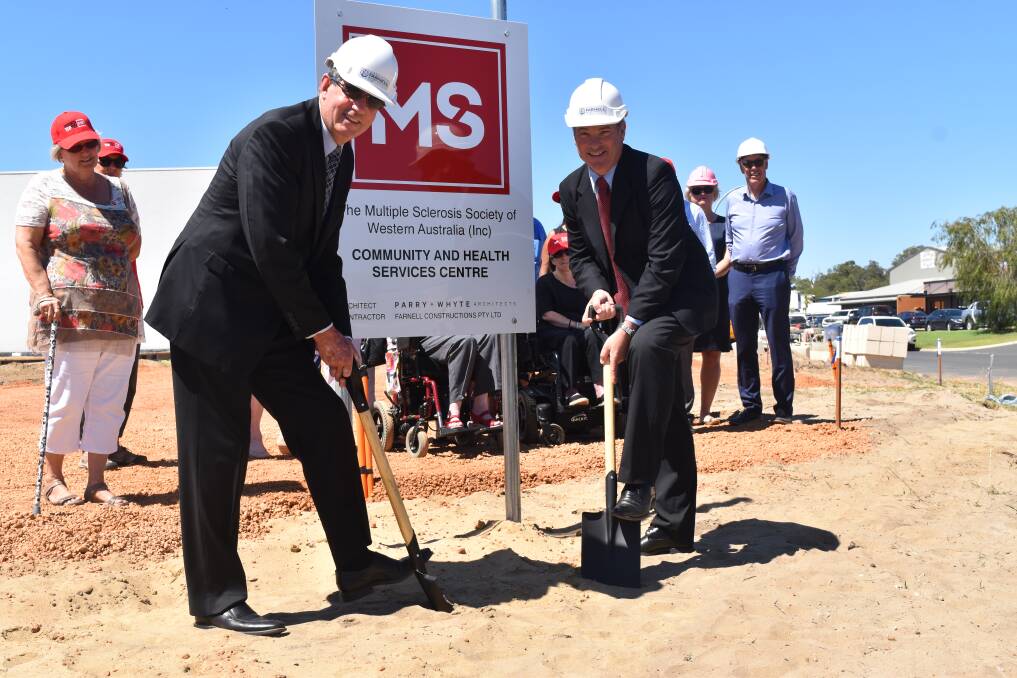 Multiple Sclerosis Society of WA chief executive Marcus Stafford and Mayor Gary Brennan turning the first sod where the centre is under construction on Mason Road Davenport. Photo by Chloerissa Eadie.