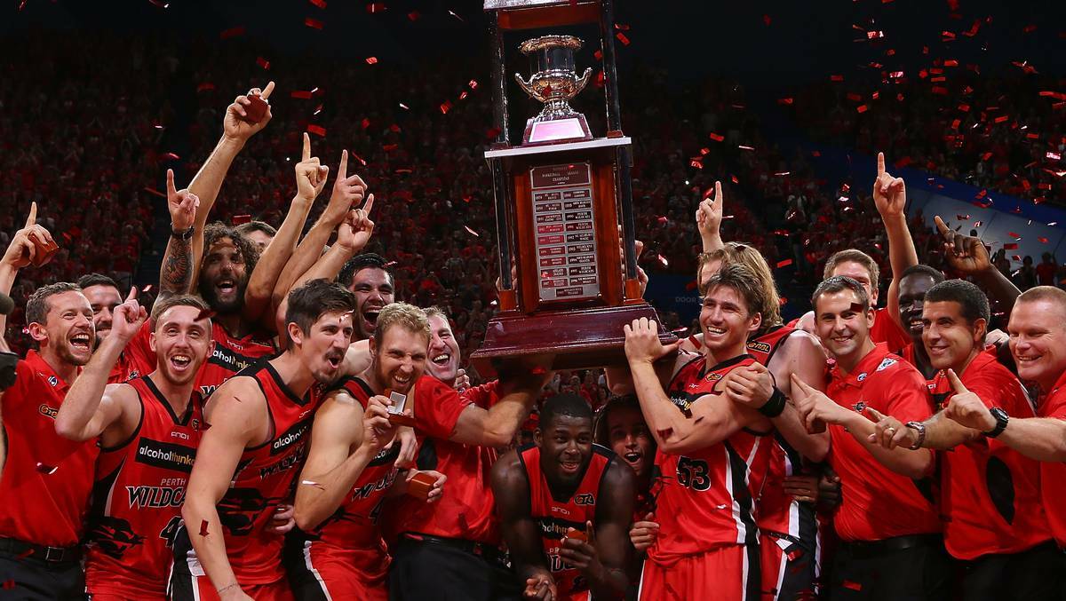 The Perth Wildcats, pictured winning the 2013/14 National Basketball League premiership, will play two pre-season games in the South West in September. Photo: Getty Images.