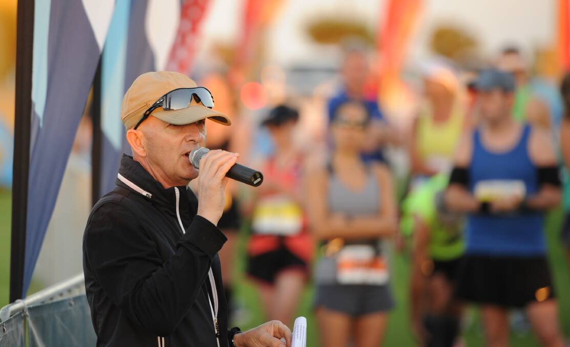Tony Minards instructs the marathon runners.