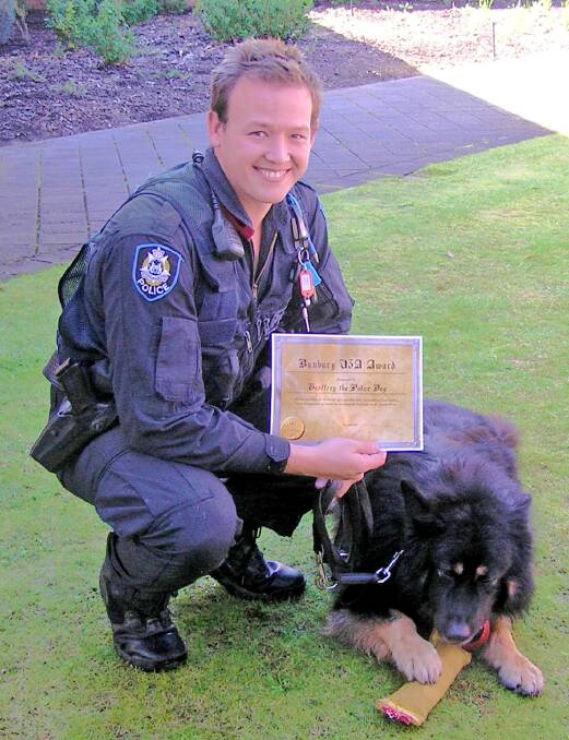 Police constable Jake Carruthers and police dog Geoffrey.