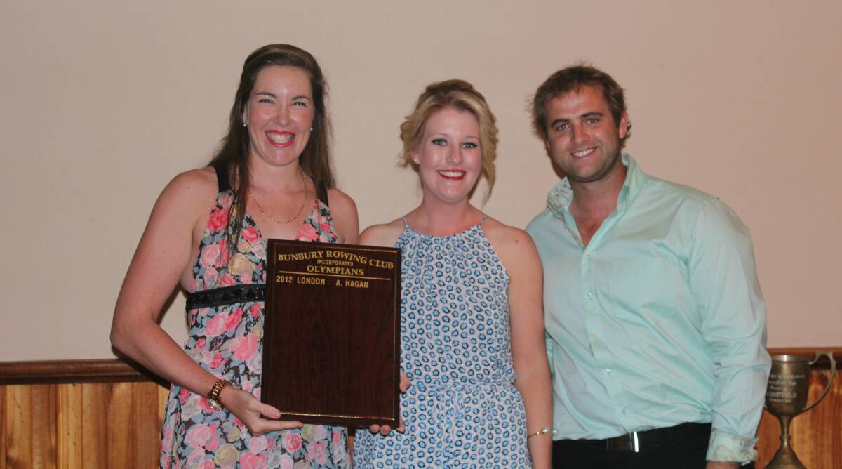 Alexandra Hagan is pictured with Bunbury Rowing Club captain Caitlin Prosser and president Jayden Edwards.
