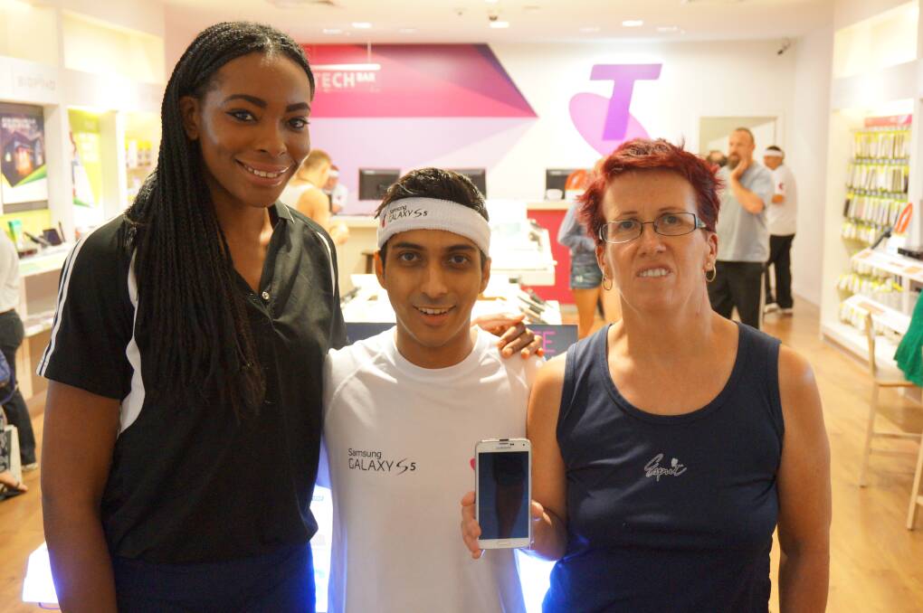 Basketballer Valerie Ogoke, Bunbury Telstra store manager Vivian Miranda and fitness enthusiast Susan Sorrell at the launch of the new Samsung Galaxy S5.   