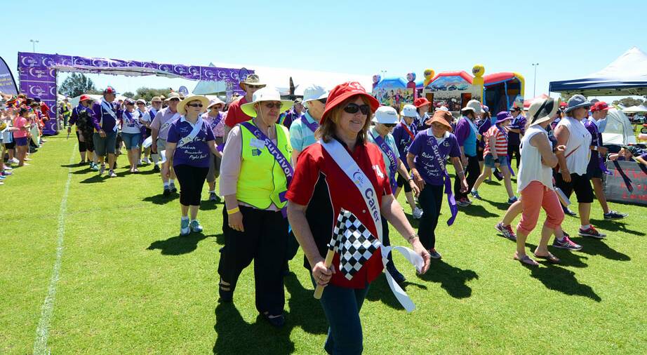 Survivors and carers walk a lap of honour at the start of each Relay For Life. 