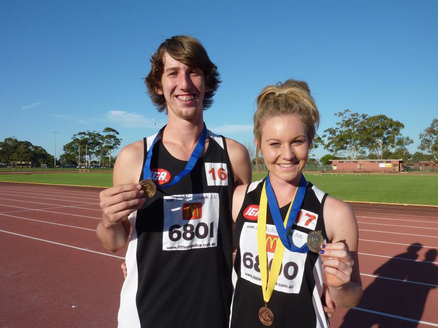 Bunbury athletes Mitchell Horner and Brooke Rogers with their state championship medals. 