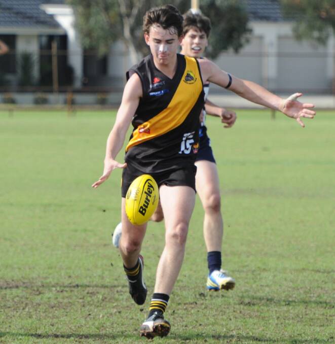 Connor Blakely pictured playing for the Bunbury Bulldogs in 2013. Photo: Ted May/Bunbury Mail. 