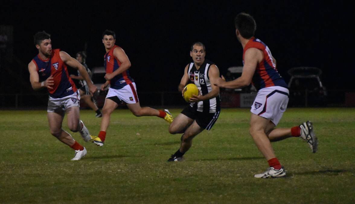 Dominant 'premiership' quarters from Busselton puts them in the driving seat for season 2015. 