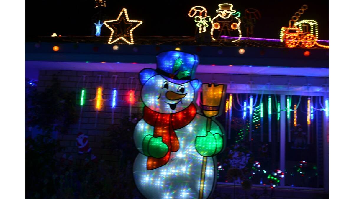 Homes light up in the spirit of Christmas.