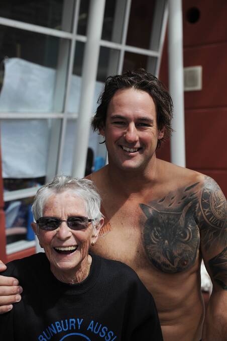 Bunbury man Brent Whitton took part in the Bunbury Swim for MS on Sunday in memory of their dad Colin, who died in a workplace accident at Worsley last year. He is pictured with Marie Harris. Picture by Ted May. 