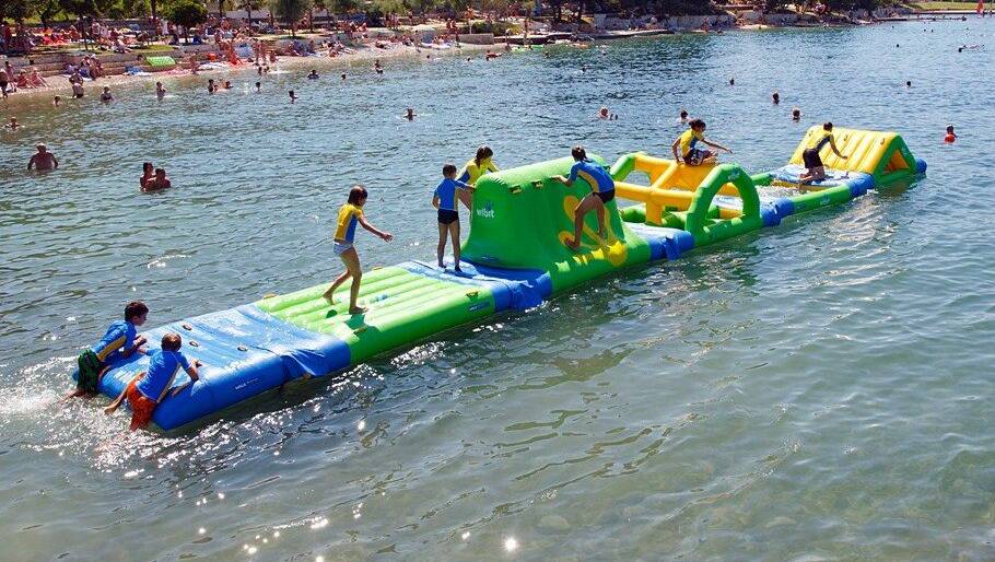 An example of equipment that could be used in a local water bounce park. 