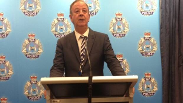 Detective Superintendent Glenn Feeney outlines the charges to reporters. Photo: Ray Sparvell
