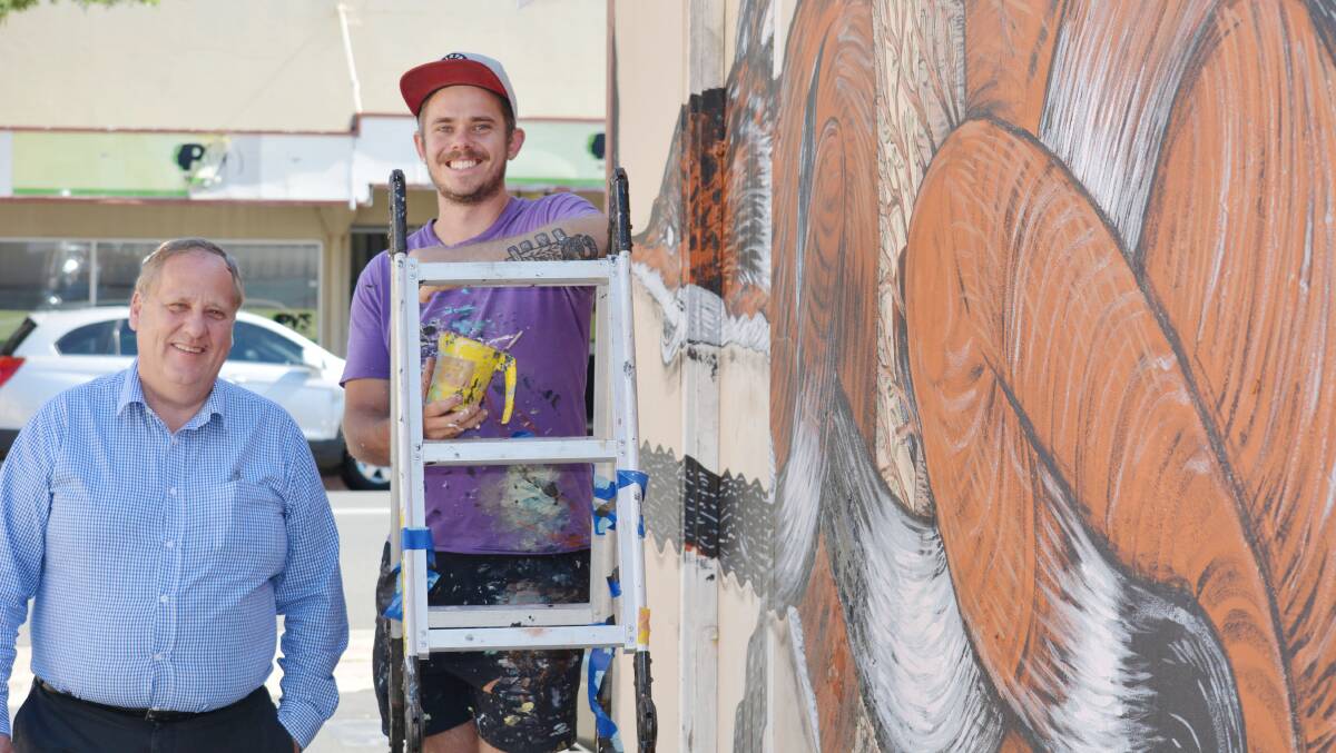 Bunbury Re.Discover street art project creator Andrew Frazer thanks South West Development Commission chief executive Don Punch for the funding boost. 