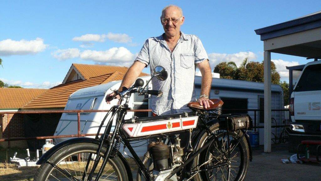 Bill Pike displays his vintage motorcycle.