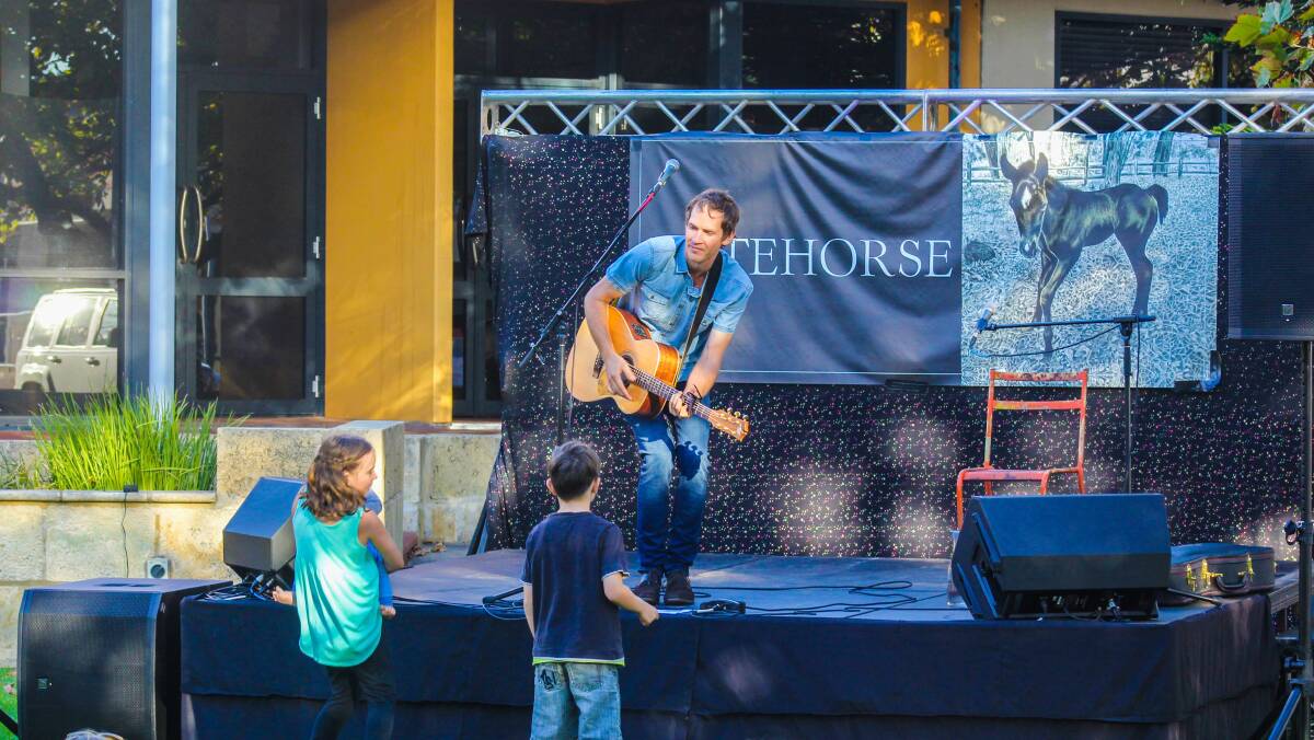 People of all ages got into the spirit of Guppy Park's first acoustic Sunday session last week. Photo by Mario Gelsomino. 