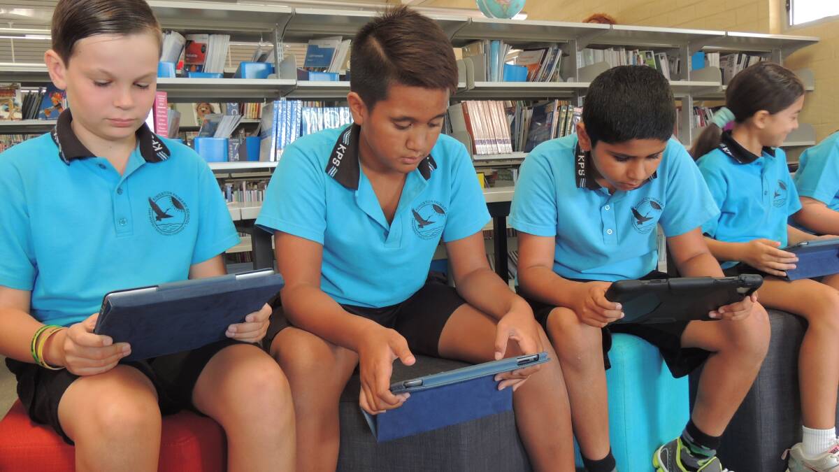 Students at Kingston Primary School improving their math skills on a new program. 
