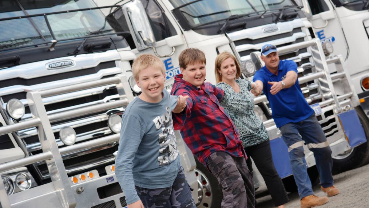 Bunbury company HTE Transport has signed up to the Val Lishman Health Research Foundation 2014 Qube Truck Pull and Festival in support of the Elson family. Pictured is Liam, Jarrod, Giselle and Greg Elson. Picture by Teneille Watson. 