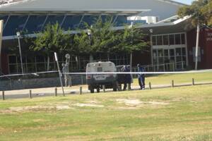 Police investigate the stabbing at the South West Sports Centre.
