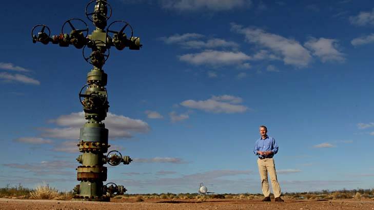 Petratherm Exploration manager Peter Reid at a geothermal wellhead in South Australia. Photo: Alex Ellinghausen