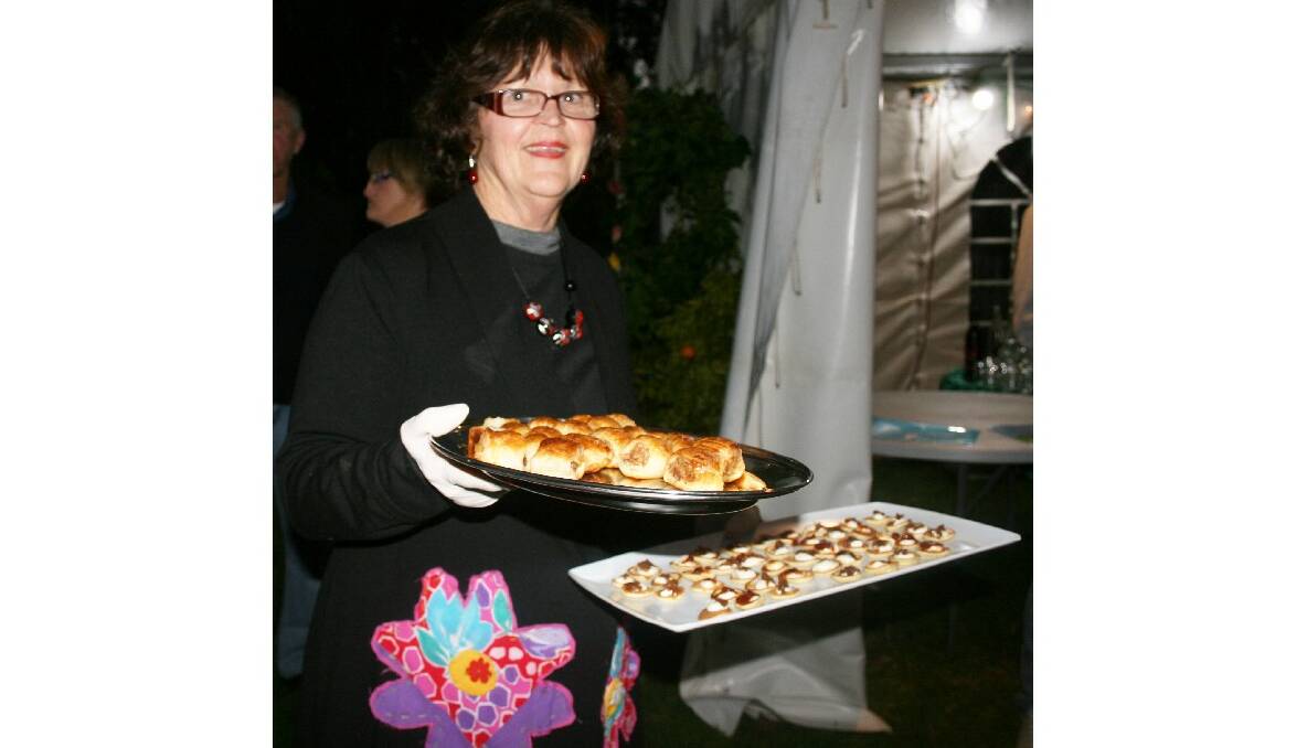 Bev Cross serving food at the opening of the Nannup Flower Festival. Photo: Rachel Tyrrell