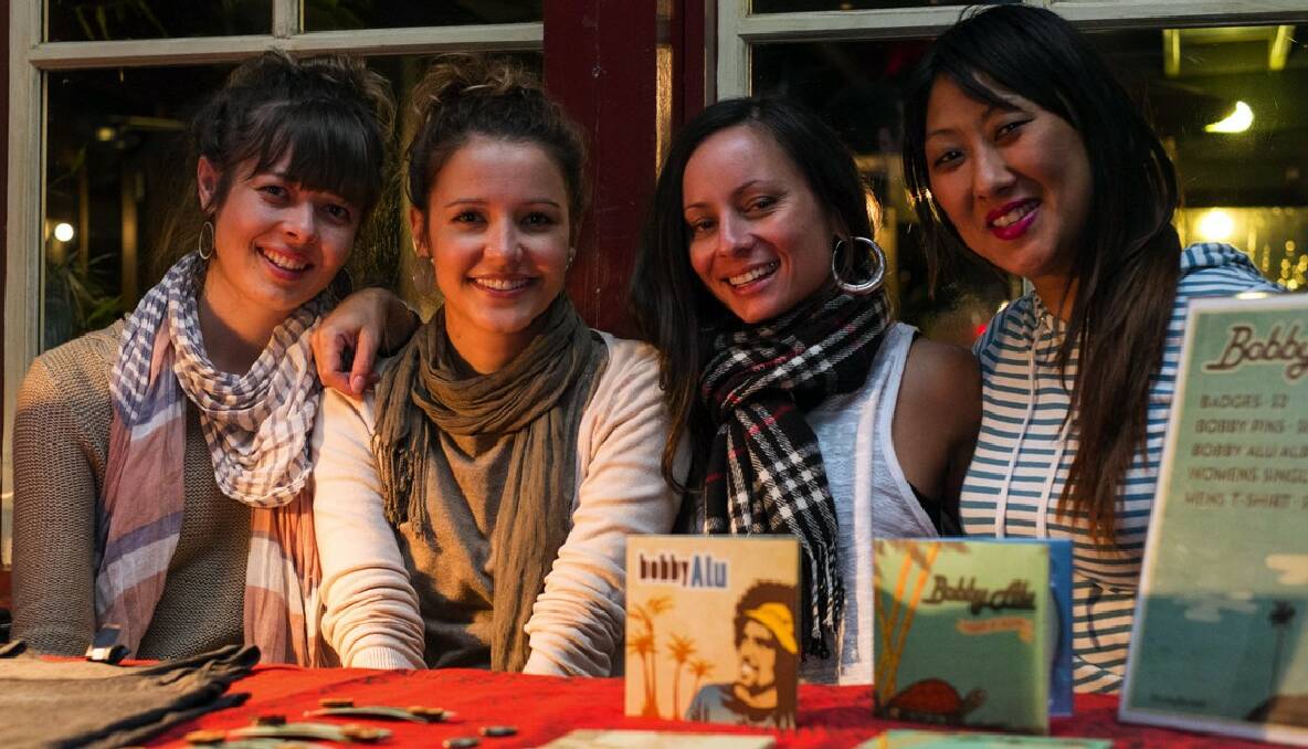 At the merch desk for Bobby Alu's gig at Settlers' Tavern, Jodi Anderson, Nina Lucas, Donna Gee and Erica Shin. Photo by Sandy Powell. 