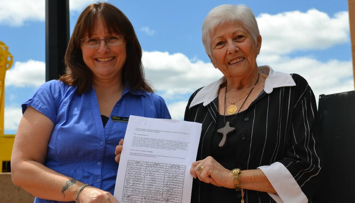 Collie Visitors Centre tourist officer Tracey Peach and bus user Pat Garofano are championing the protests against the cancellation of the Boyup Brook-Collie-Australind TransWA bus service. Photo: Collie Mail.