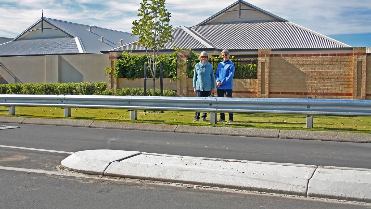 Residents Joan Spencer and Elisabeth Crombie feel a lot safer now Dardanup council have installed guard rails and a median strip on Edith Cowan Drive in Eaton. 