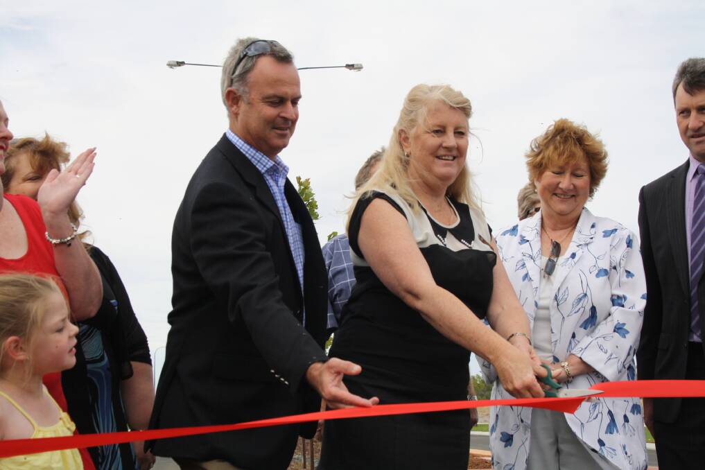 Kingston Drive is officially opened by Harvey Shire president Tania Jackson, with property developer Stuart Lester and Bunbury Catholic College principal Denise O’Meara.