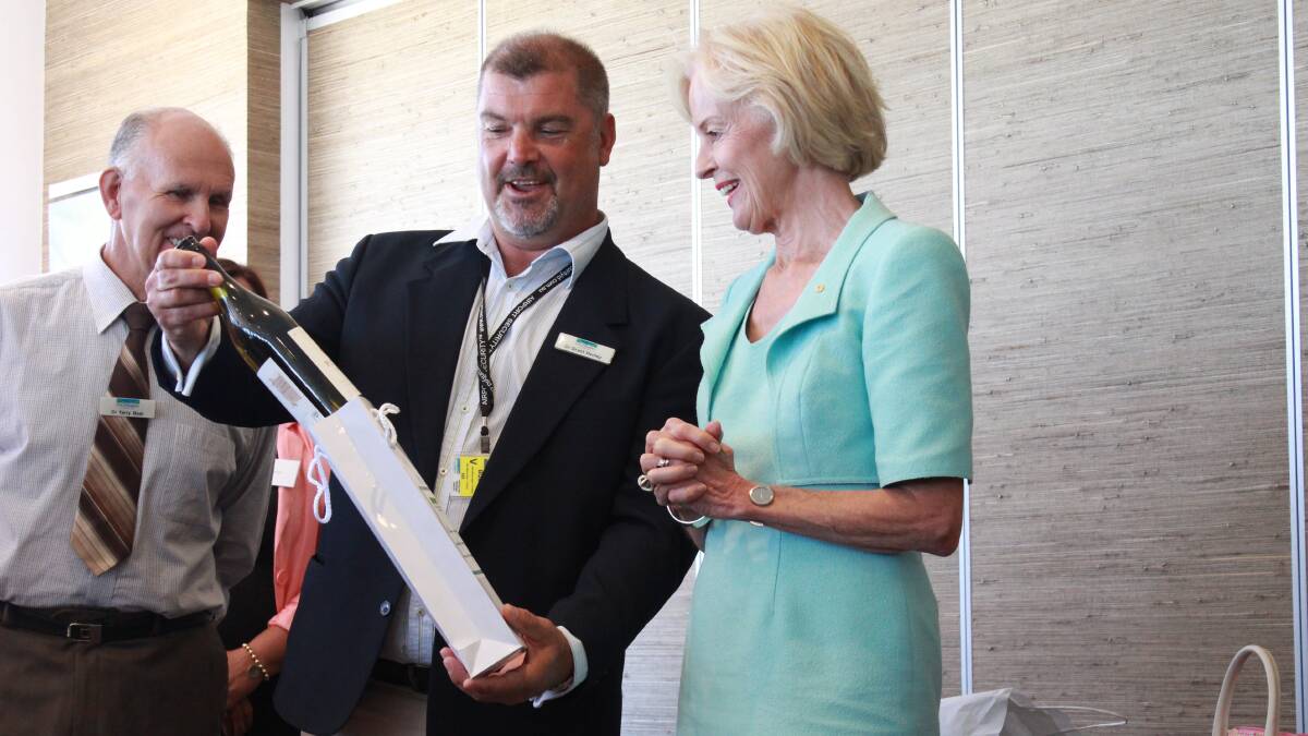 Deputy Mayor Grant Henley presenting a present to the Governor General of Australia Quentin Bryce.