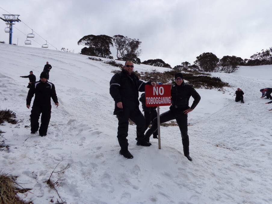 Bunbury Police officers detective Jon Munday and Sergeant Dan Talbot on Mount Hotham in Victoria as part of the Wall to Wall ride.