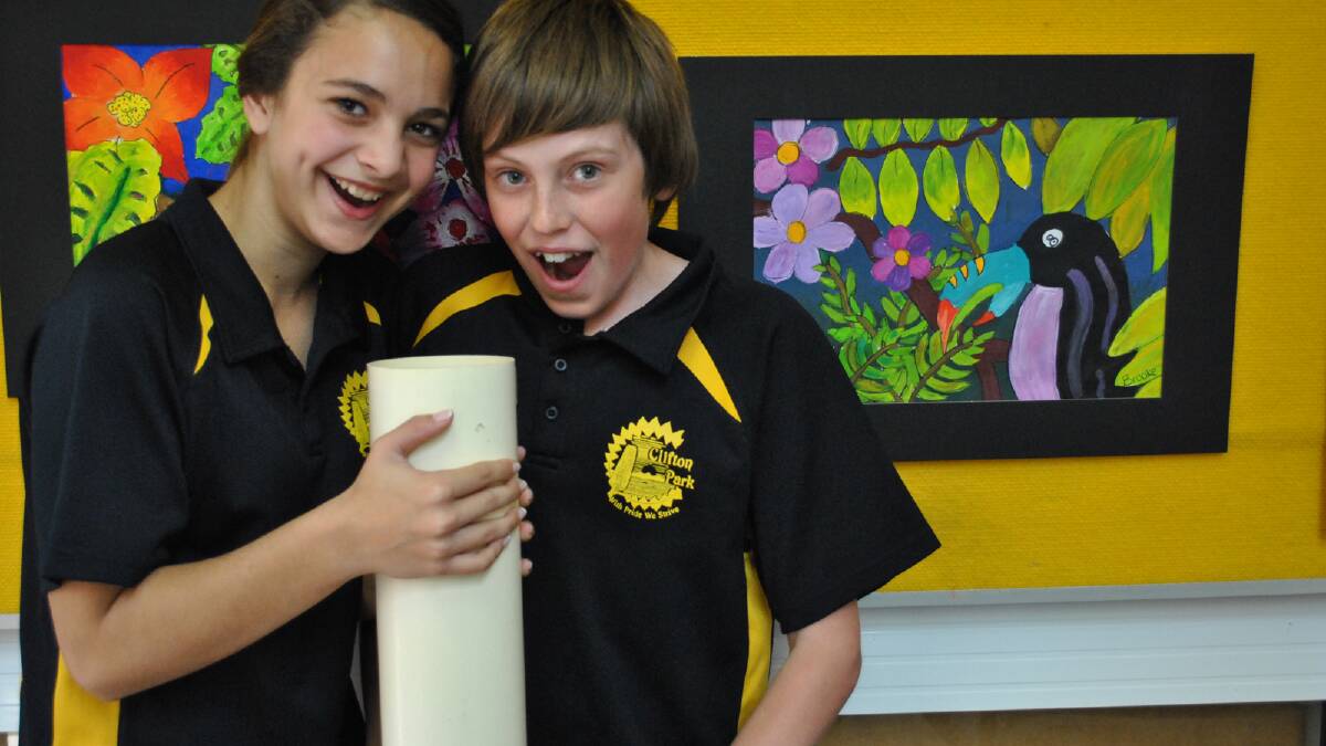 Clifton Park Primary head girl and boy Ryley Clarke and Braydon Watkins were surprised to discover the time capsule, which was buried 25 years ago, empty.