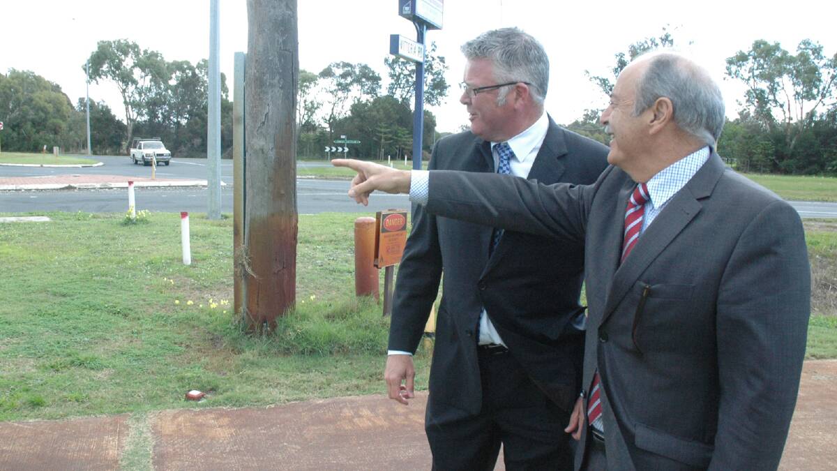 Transport minister Troy Buswell and Bunbury MLA John Castrilli at the Australind Bypass and Vittoria Road intersection which will be upgraded. 
