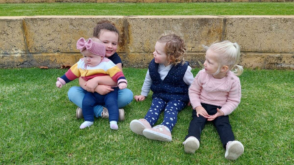 Four babies in 2021: Hannah Montgomery holding her little sister Bonnie, Beth Tennent-Brown and Zarley Harris. Picture: supplied