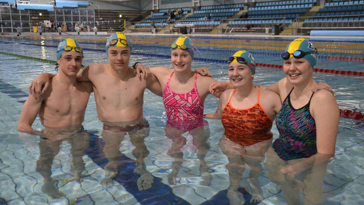 Champions: Swimmers Rebecca Camm, Ingrid Blandford, Joel Davies, Alex Saffy and Abbey East (not pictured: Kaiden Richings). Picture: Pip Waller 