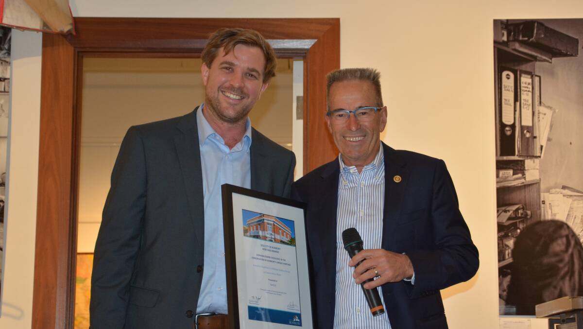 Award for Excellence in Heritage Building Design and Conservation: Bunbury mayor Jaysen Miguel with Kevin Coote who accepted the award on behalf of the former Commonwealth Bank. Picture: Supplied