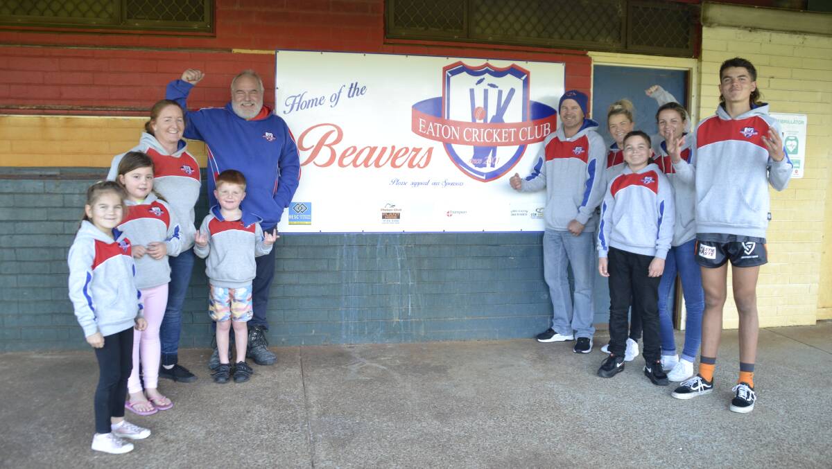 20 years: Eaton Beavers Cricket Club President Travis Johnson and Secretary and Life Member Mick Rogers at the club grounds with players from the women's and junior teams. Picture: Pip Waller 