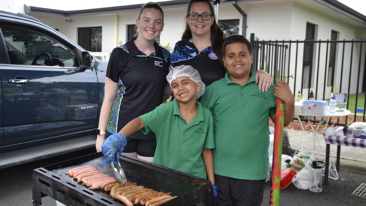 Fundraiser BBQ: Goodstart Early Learning Centre assistant director Monique Suckling and centre director Tara Bennell with Tyrell and Royce Bennell. Picture: Pip Waller