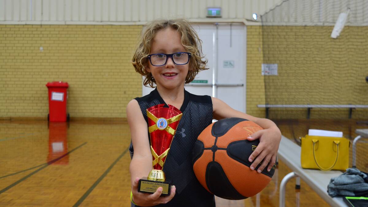 Winners are grinners: Six-year-old Levi Andrew took out the under 9s mixed MVP award at the Noongar Basketball Carnival. Picture: Jemillah Dawson. 