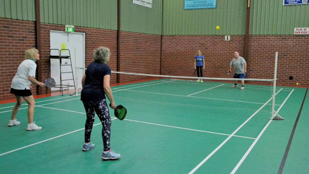 Morgan having a hit at the Bunbury badminton courts. 