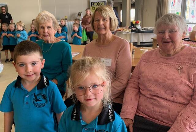 Showing kindness: Kingston Primary School students Scarlett Holden and Lachlan Hicks with Bethanie Residents. Photo: supplied. 