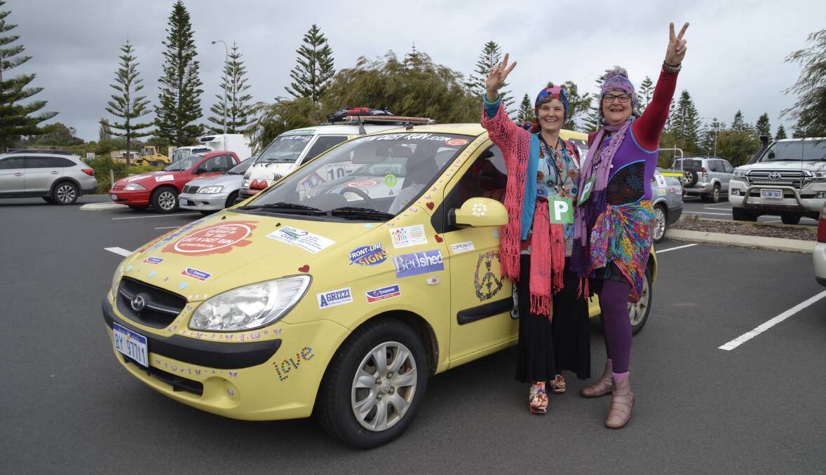 Dirt and Dust run participants Charmaine Fuller and Michele Keyser dressed up as hippies, with car number nine, nicknamed "Daffy the Duster". 