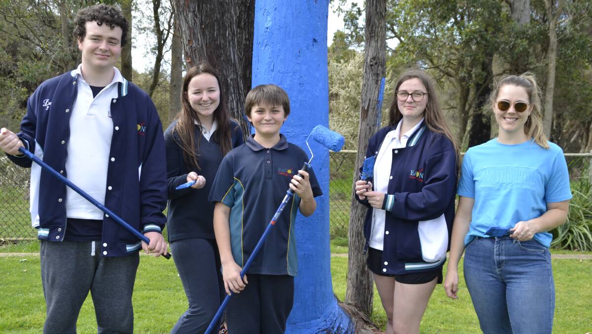 Eaton Community College students Will Coole, Charlotte Garrigan, Tame Campbell and Olivia Greathead with Blue Tree Project chief executive officer Kendall Whyte. 