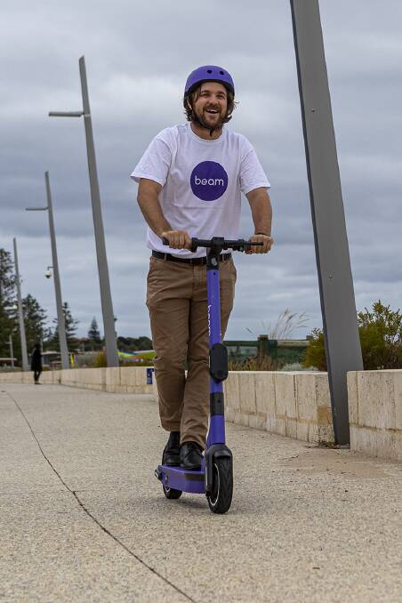 A "fun and affordable" way to get around: Bunbury mayor Jaysen Miguel using one of the e-scooters during the 2020 trial. Photo: supplied 