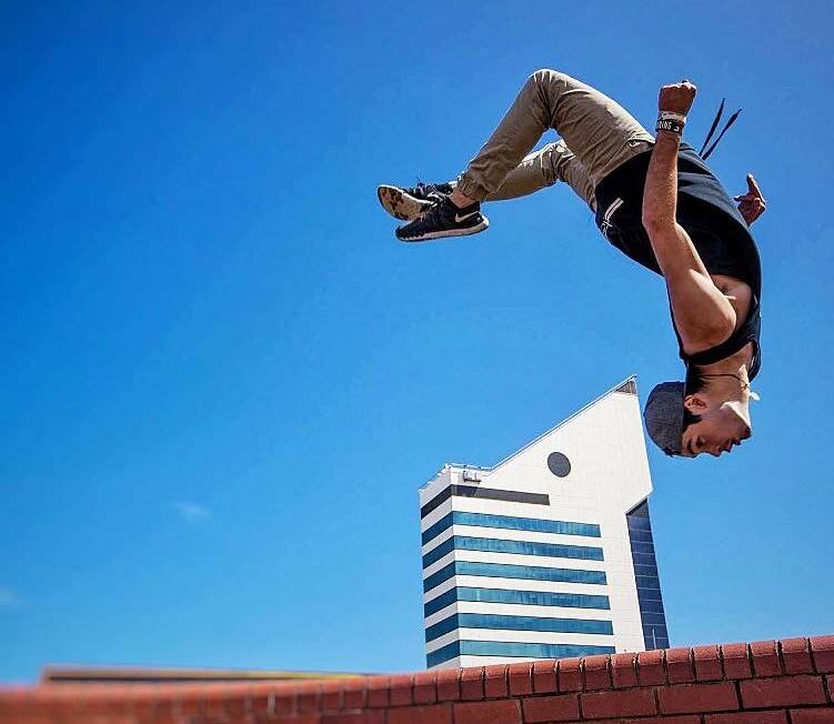 Flips and tricks: X5 Academy co-founder Will Tuck performing parkour in Bunbury. Picture: supplied