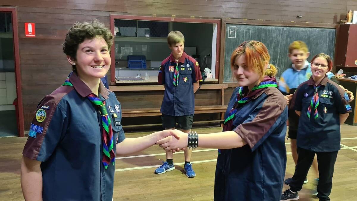 Welcoming new venturers: Ms Bayley welcoming Jonty Bayley into the Carey Park Scouts. Photo: supplied