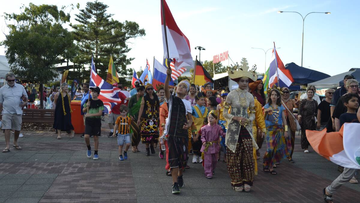 The Flag Parade: Over 50 different countries were represented by individuals passionate about sharing their culture. Picture: Pip Waller 