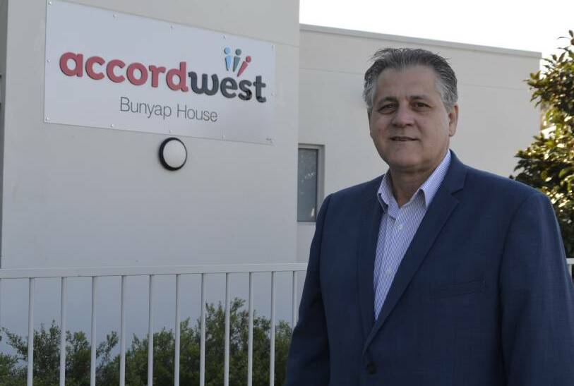 A welcome boost: Accordwest chief executive putside the existing youth accomodation, 'Bunyup House', on Forrest Ave. Picture: Pip Waller 