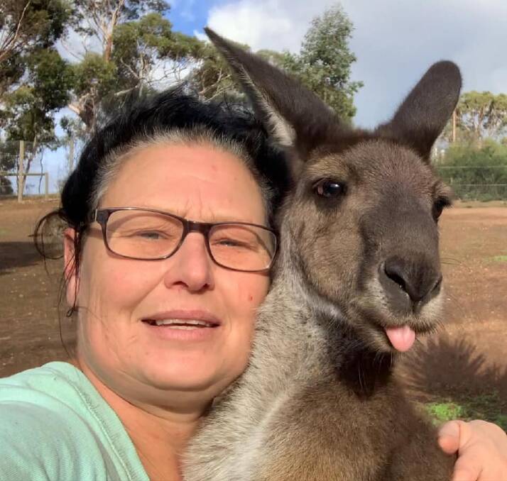 Mrs Haywood with another kangaroo names Gromit, one of 26 that live at Pumpkin's Patch Kangaroo Sanctuary. Source: Pumpkin's Patch Kangaroo Sanctuary