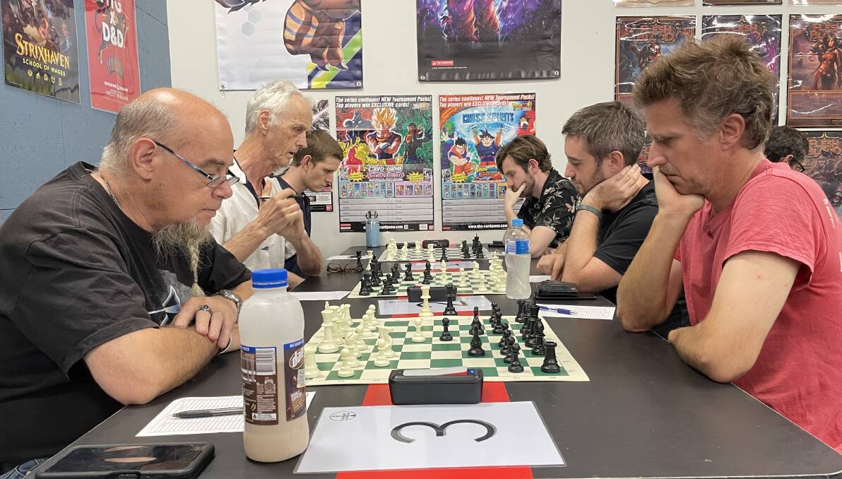 Things that make you go hmm: Bunbury Chess Club members silently locked in battle. Picture by Edward Scown.