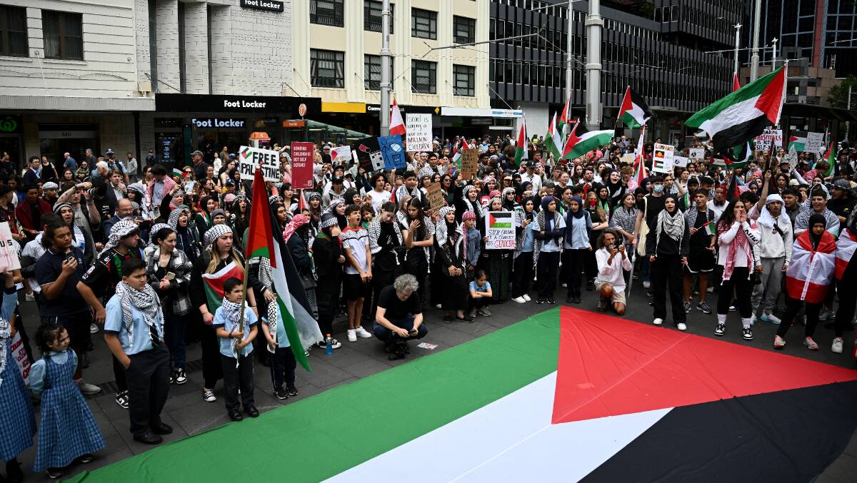 Hundreds of people gather in Sydney to show support for Palestine. Picture by AAP Image/Dan Himbrechts
