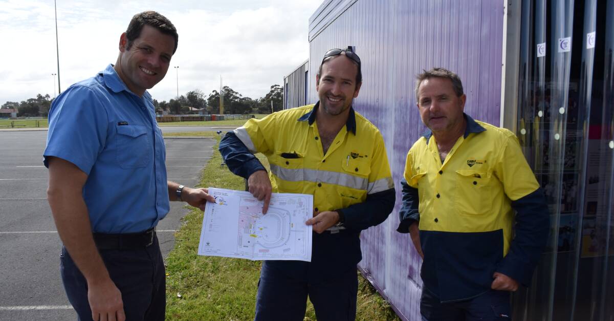 Laser Electrical's Calwyn Griffiths and Cable West's Nathan Bell and Steve Attwell go over plans for the 2016 Relay for Life.